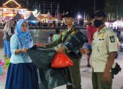 Sempena Hari Jadi Kepri Ke-20: Satpol PP Kepri Bagikan Ratusan Kantong Sampah