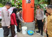 HUT Bhayangkara 79, Kapolres Bintan Serahkan Bantuan Sumur Air Bersih untuk Warga Tembeling Tanjung