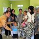 Mahasiswa UMRAH Yang Tengah KKN Bantu Tim Medis di Posyandu, Wujudkan Kepedulian Kesehatan Masyarakat
